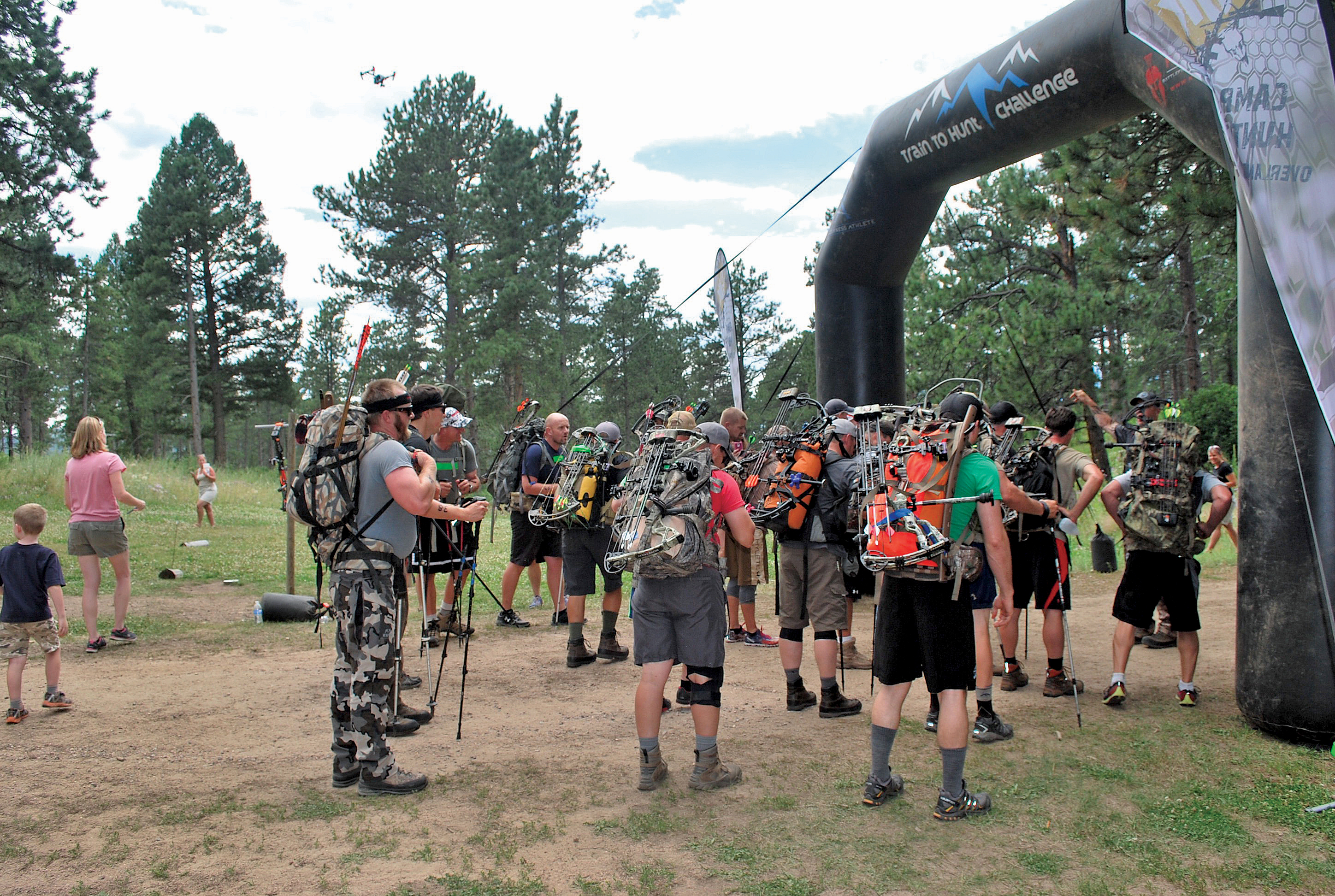 Athletes preparing for train to hunt challenge in the woods